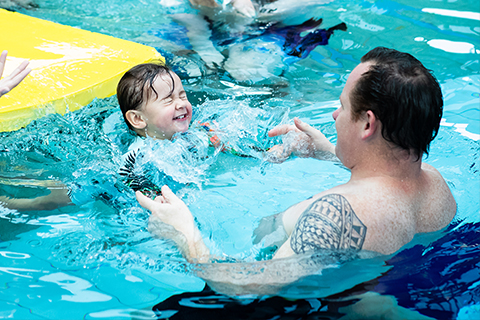 Dad and child swimming at H2O Xtream Aquatic Centre